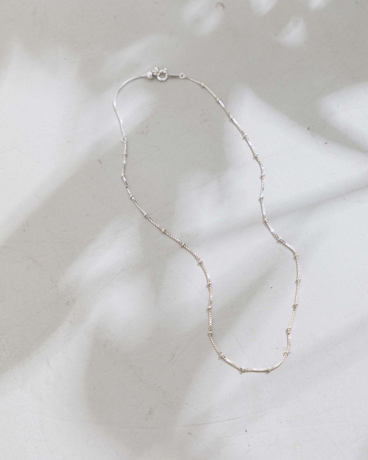 Venetian Dots Chain Necklace
Short