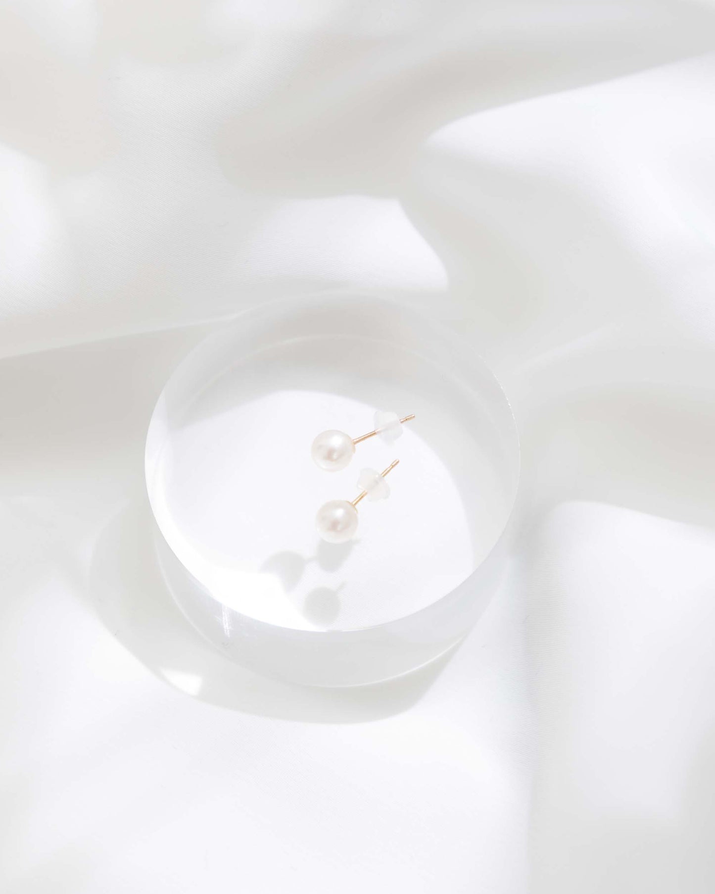 White Round Pearl Pierces